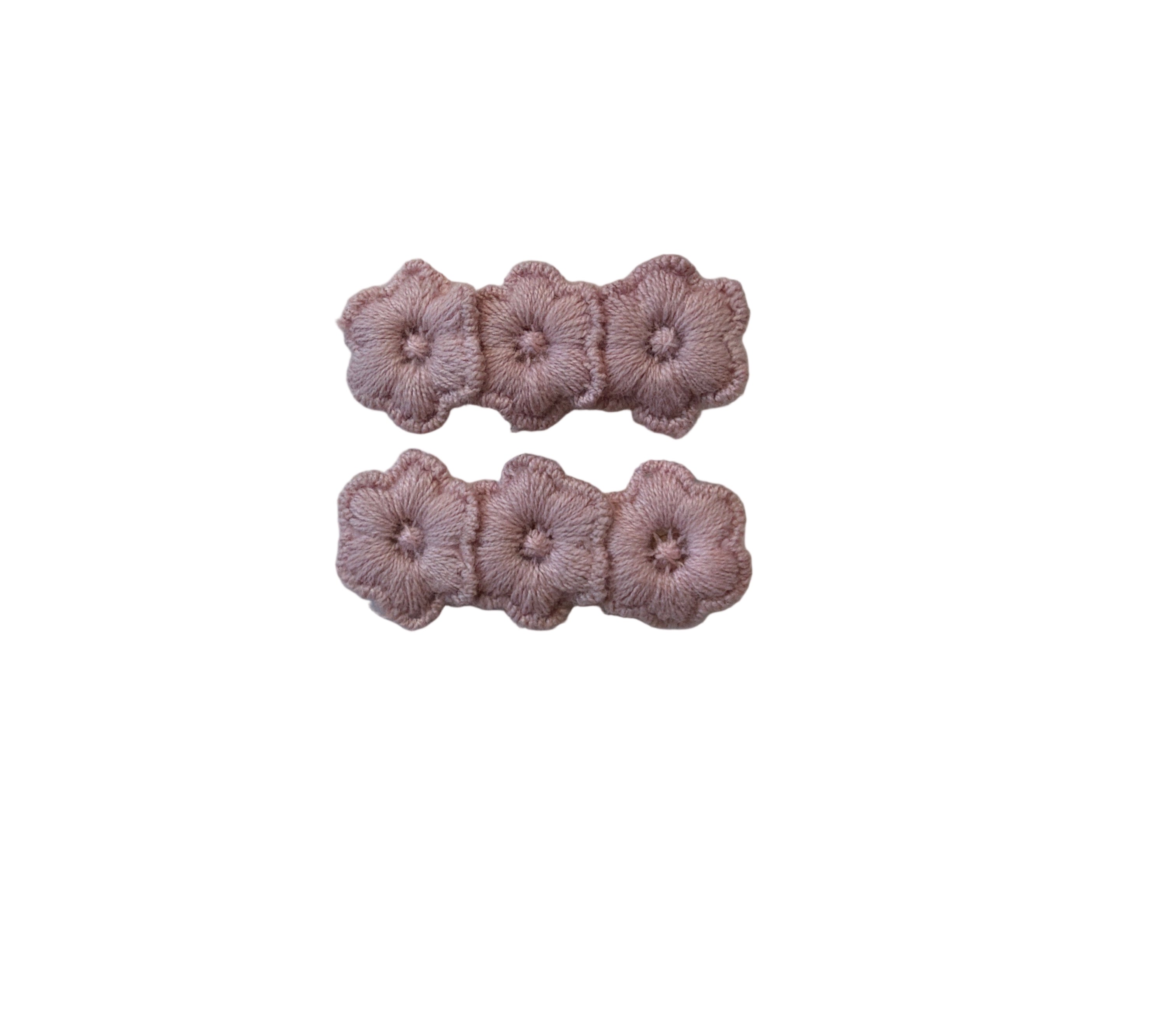 Haarklipjes roze bloementjes.